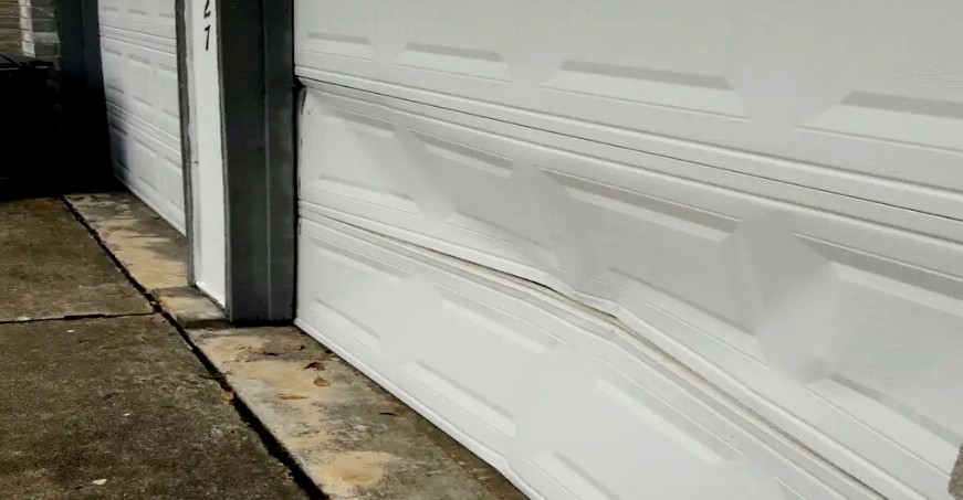 dented garage door repair